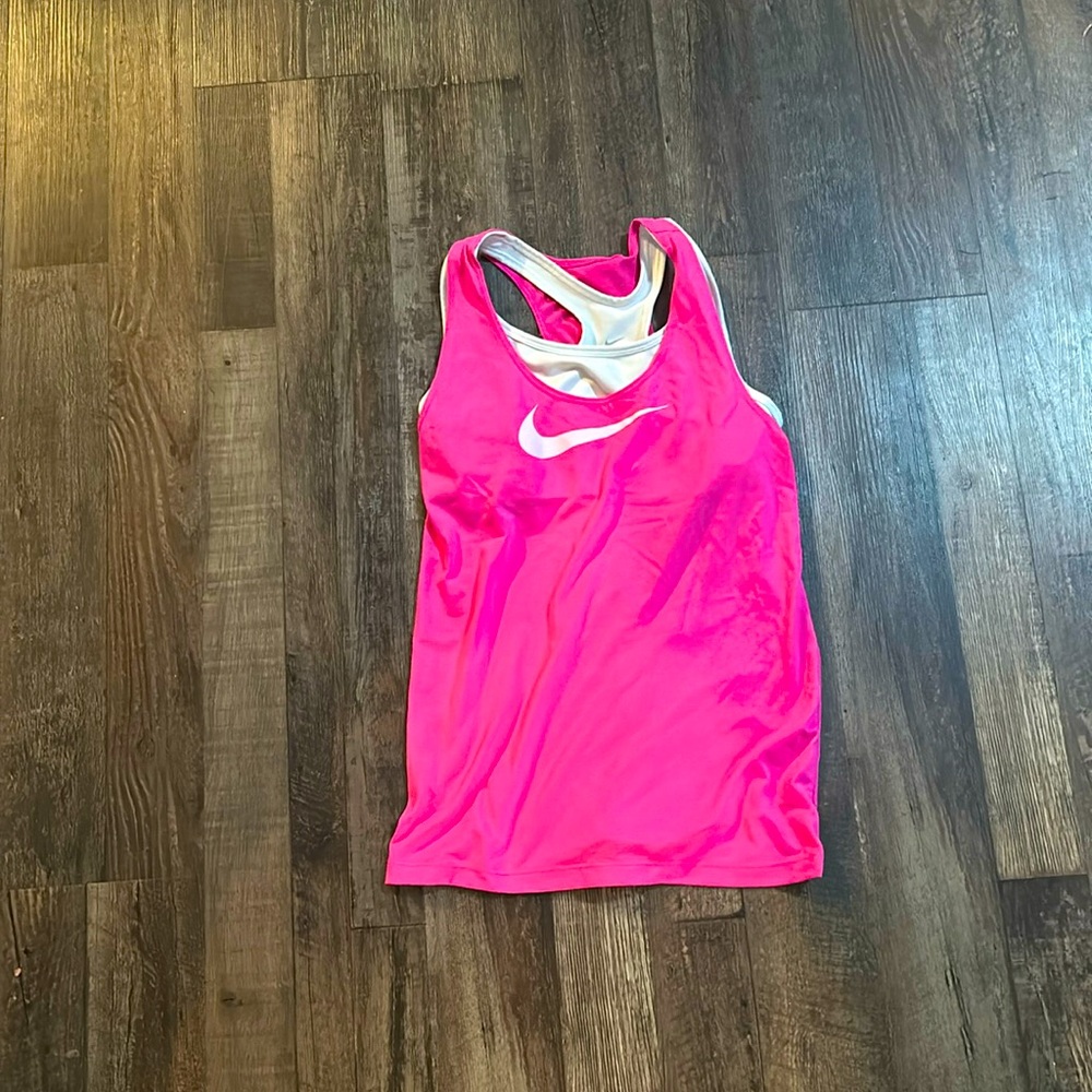 Nike tank with built in sports bra, size xxs in woman’s large in kids, pink.